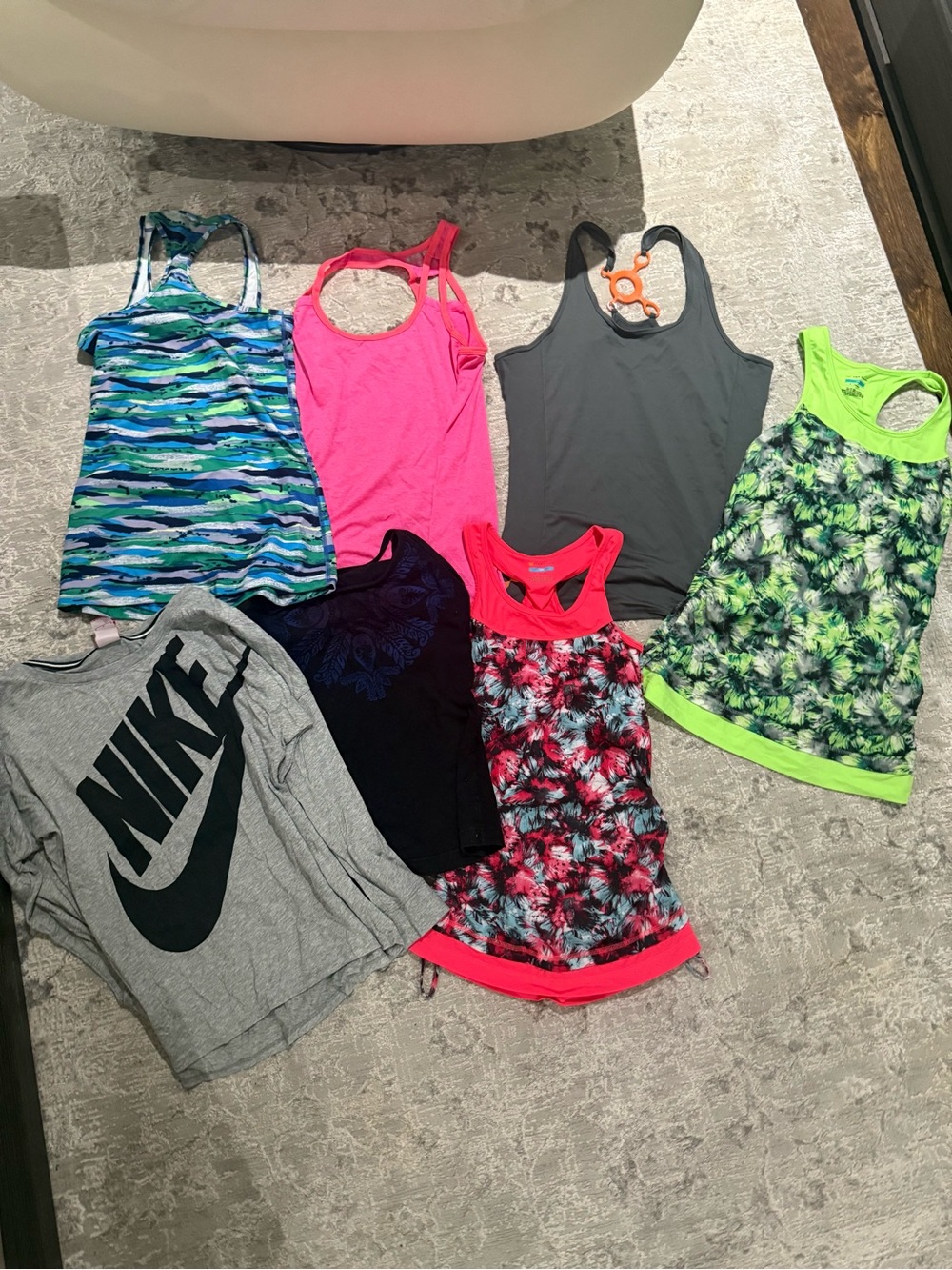 Bundle of clothes 9 Leggings 6 tank top and 1 long sleeve shirt all size small.